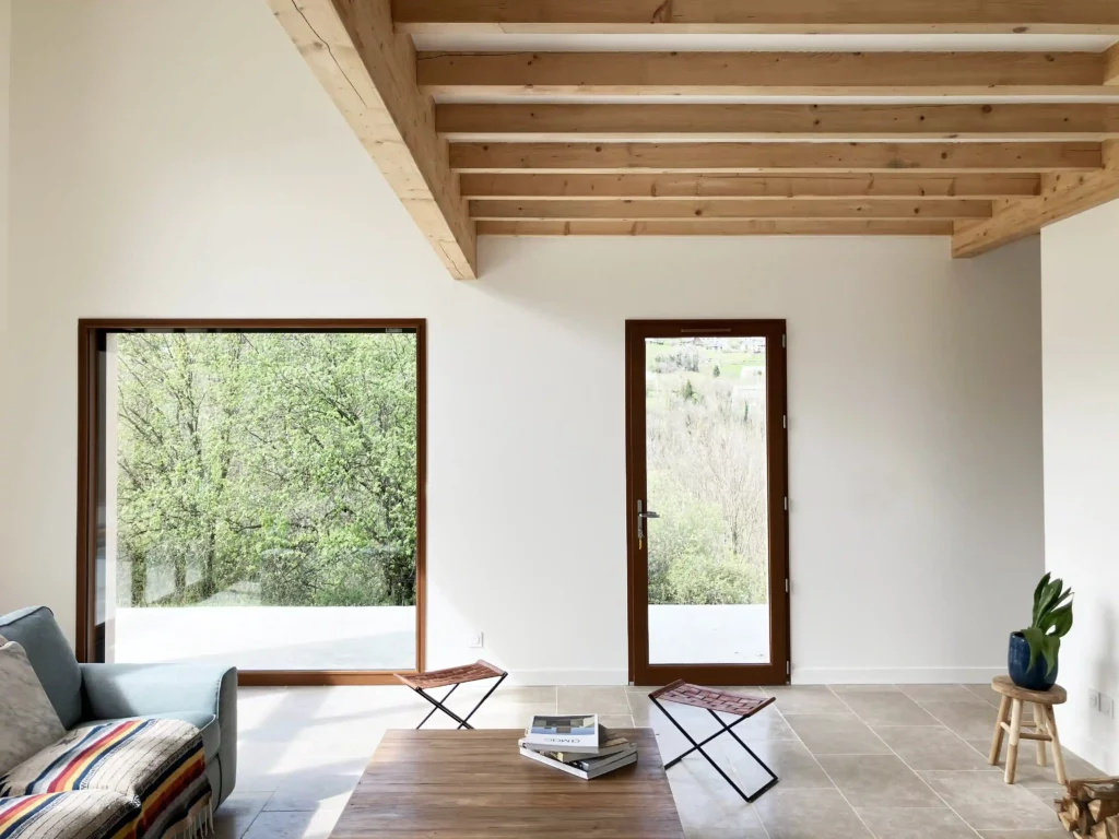 Maison construction neuve salon vue extérieure - Princz de la Chapelle